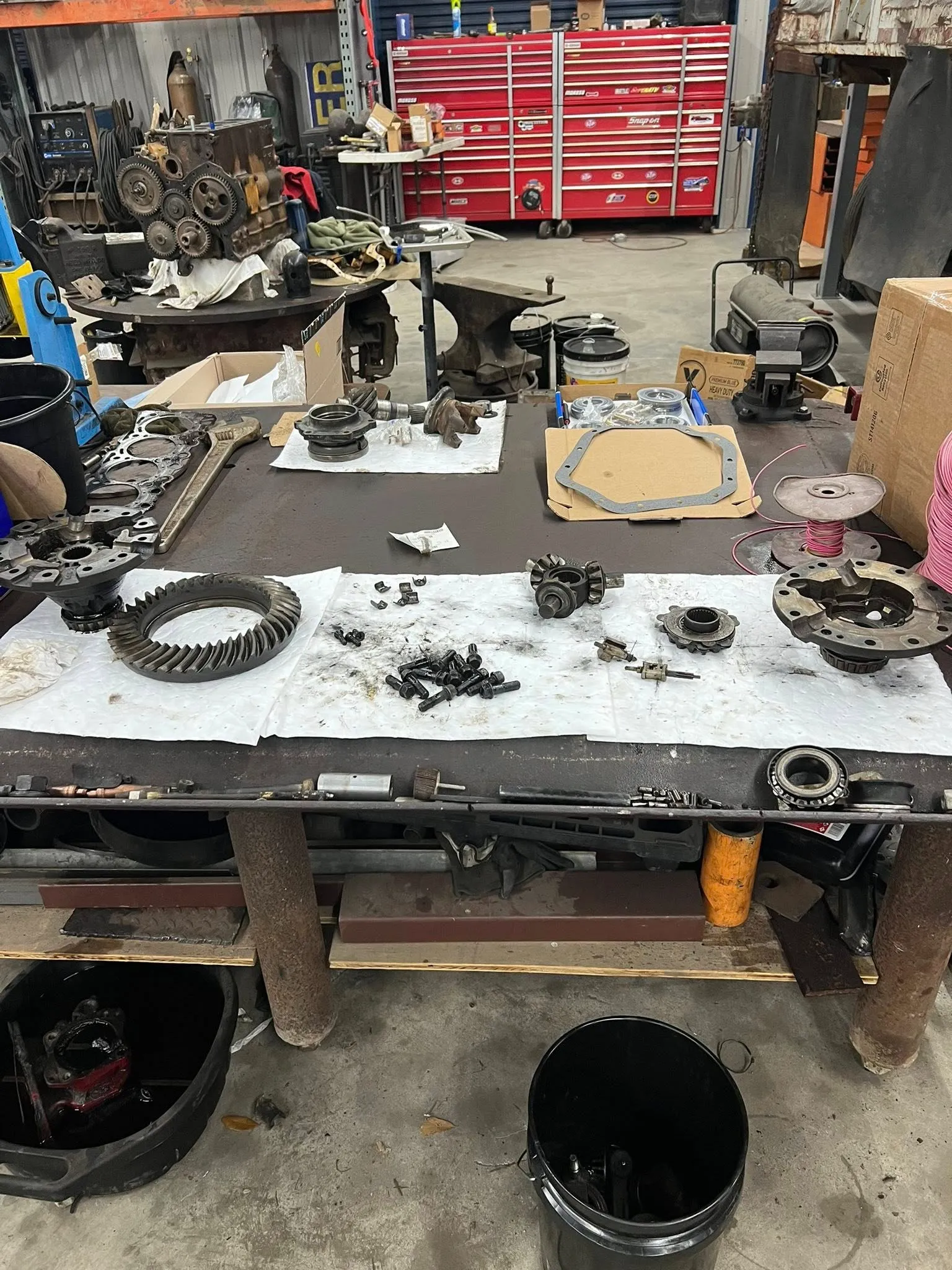 Differential parts laid out on the bench, ready to reassemble