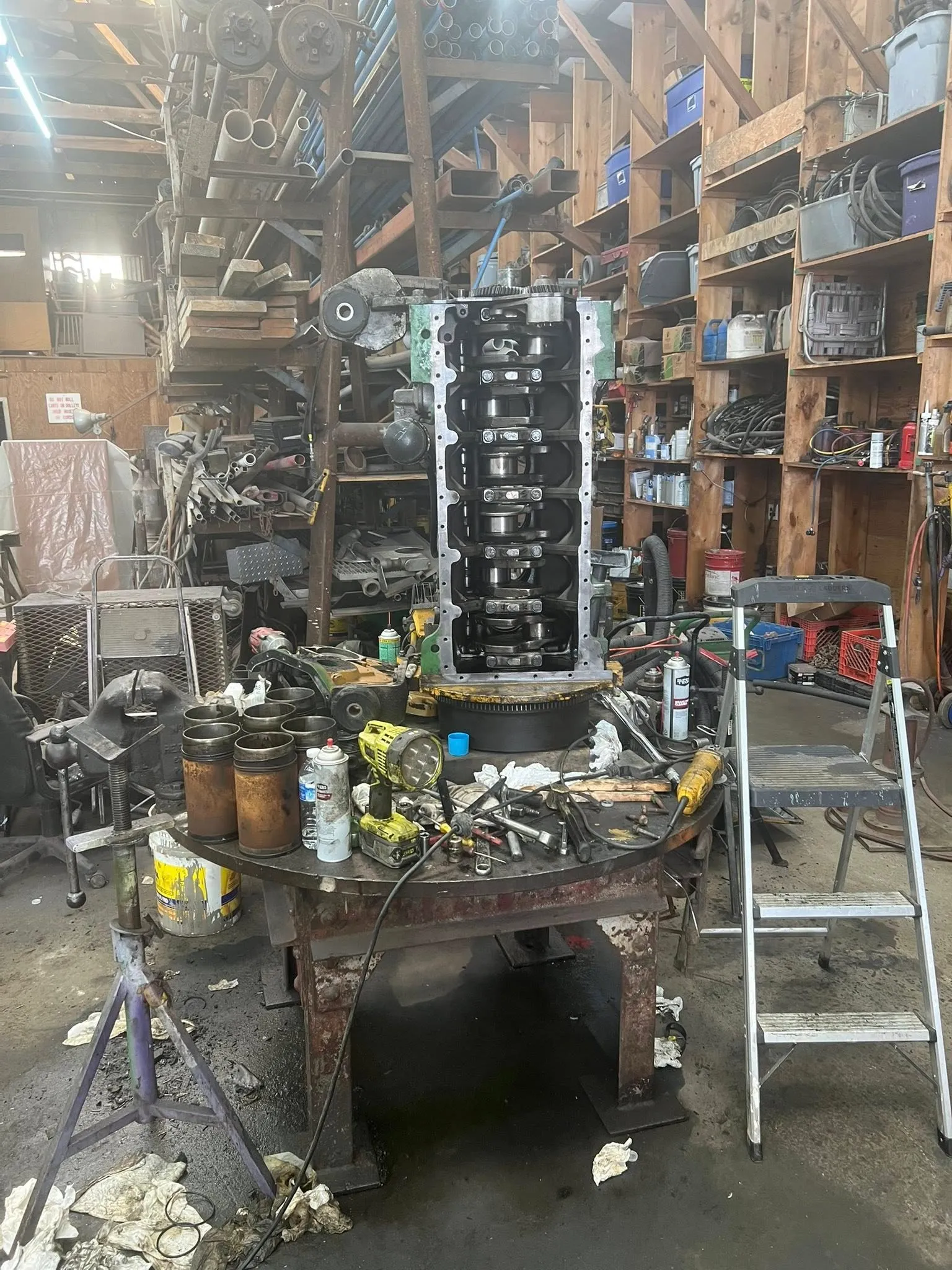 Heavy diesel block stood up for teardown and inspection
