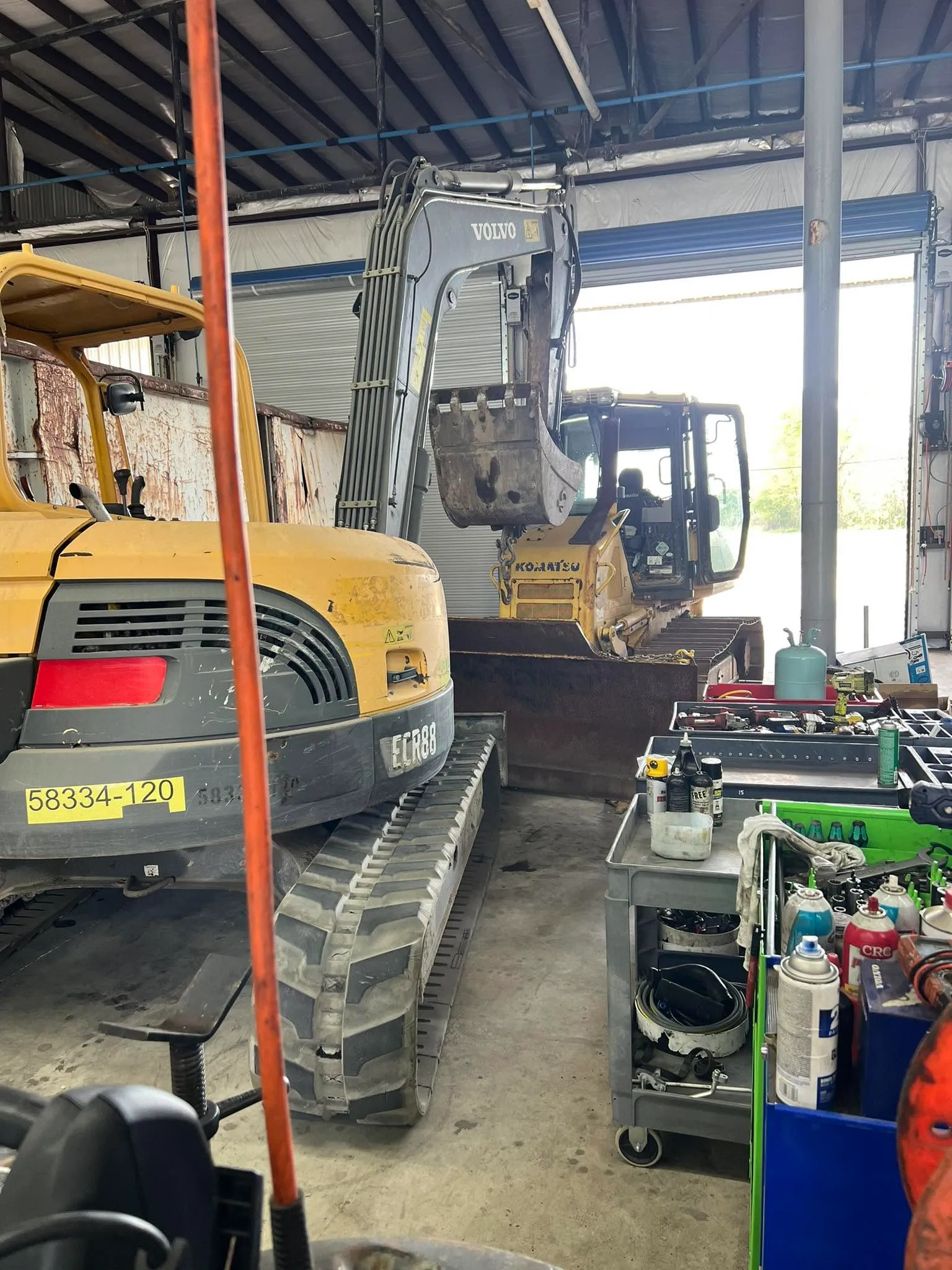 Volvo ECR88 mini excavator in the shop for service